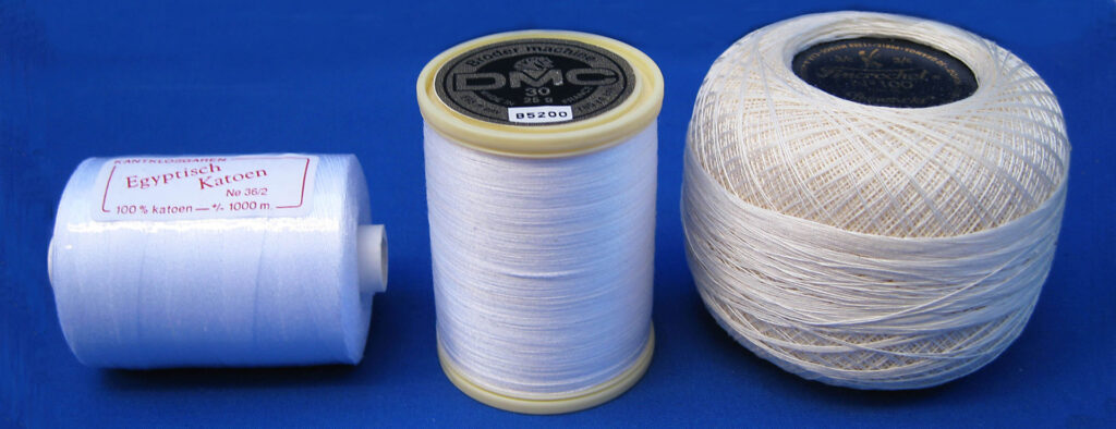 photo of spools - Structure Of Threads For Lace